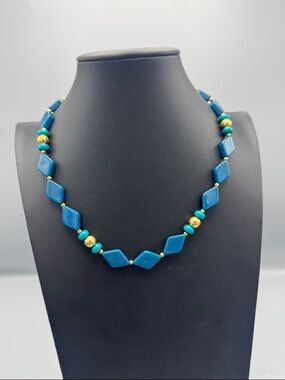 Trifari
Vintage Trifari Lucite Blue
Beaded Necklace